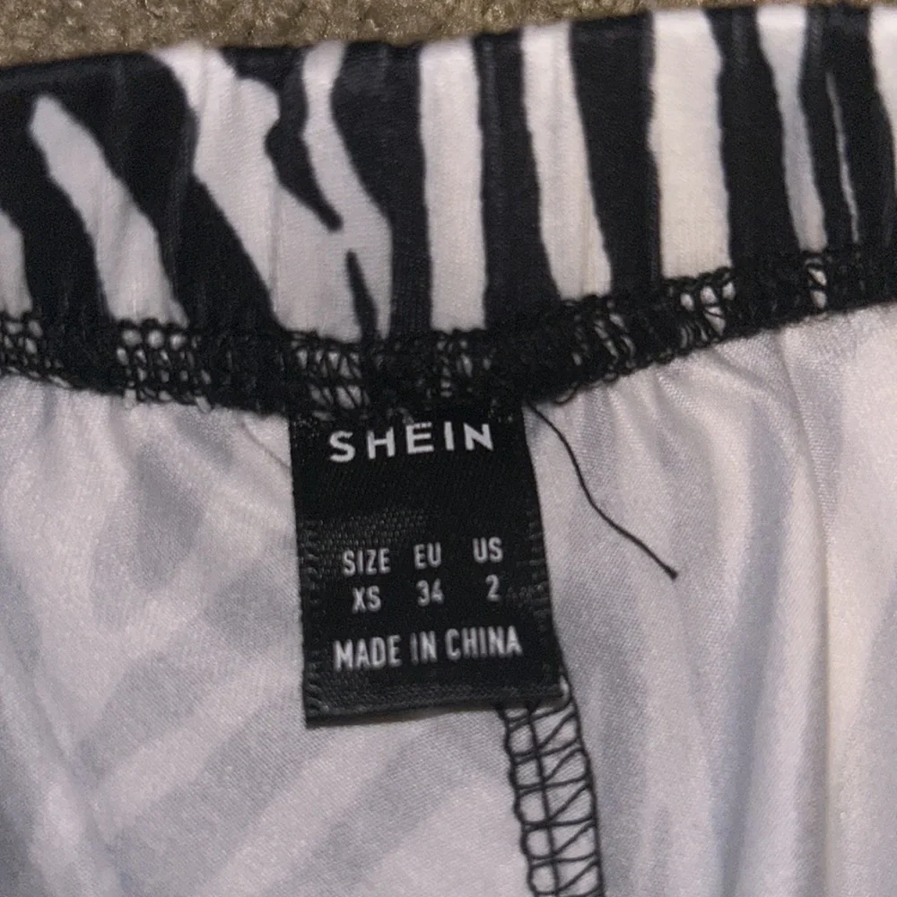 NWOT Zebra Print Flare Pants - Picture 4 of 5